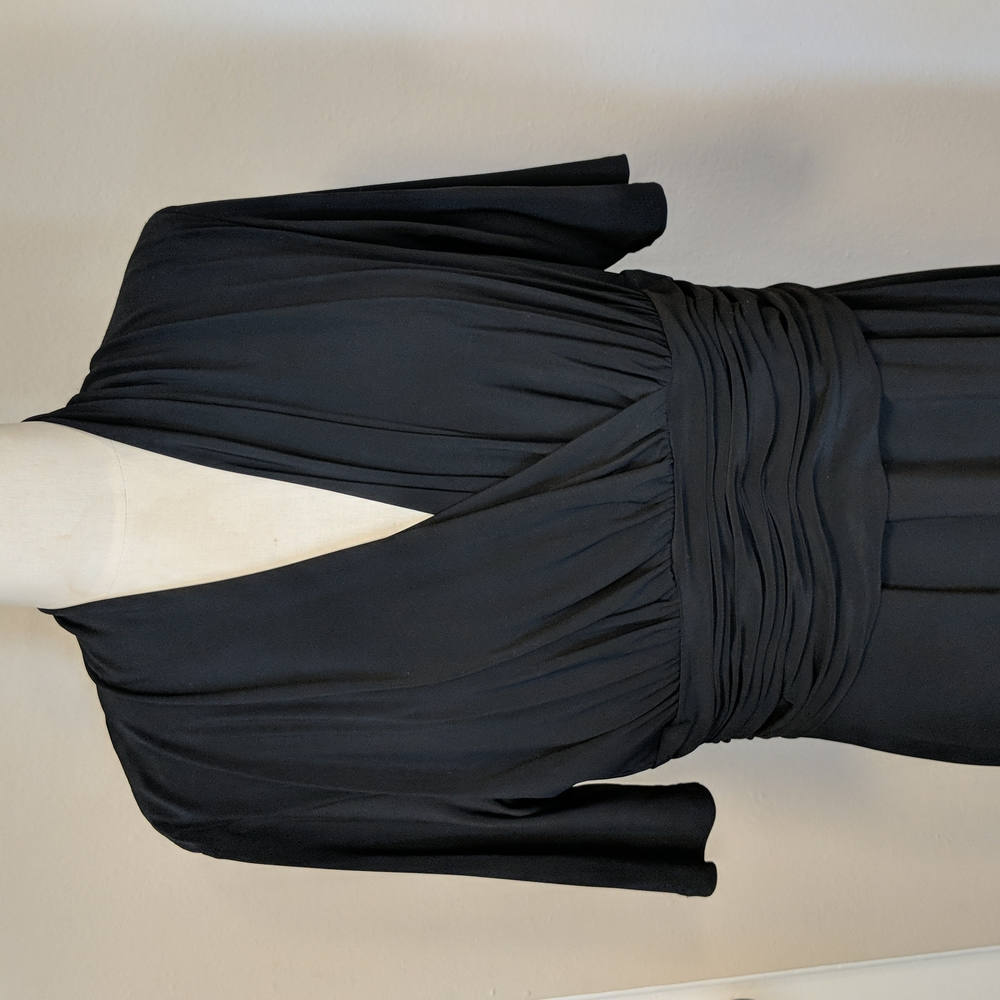 Beautiful black dress by Evan Picone, stretchy material